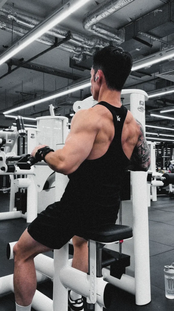 man doing seated row machine