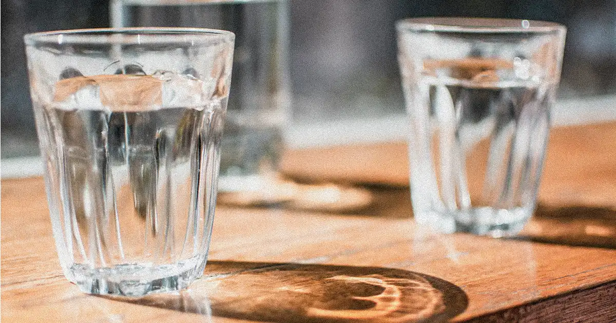 2 glasses of water on table