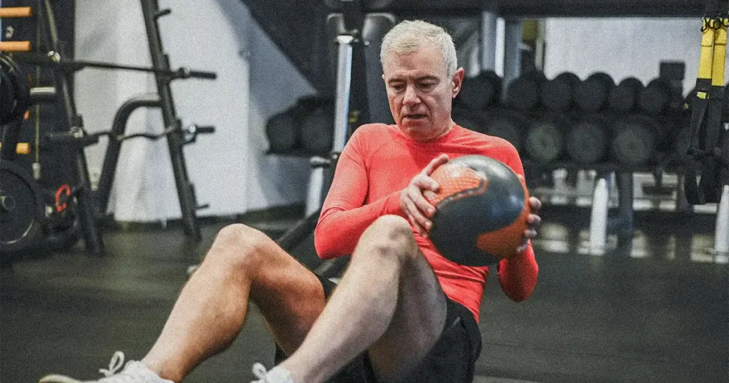 Senior doing abs workout