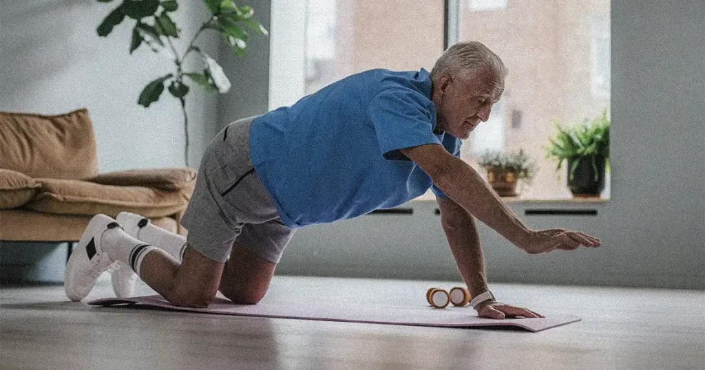 Senior doing bird dog exercise 
